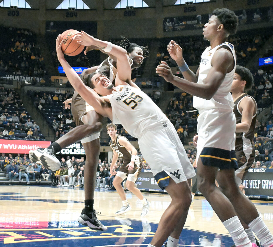 https://ogden_images.s3.amazonaws.com/www.weirtondailytimes.com/images/2025/11/10011139/WVU-hoops-930x840.jpg